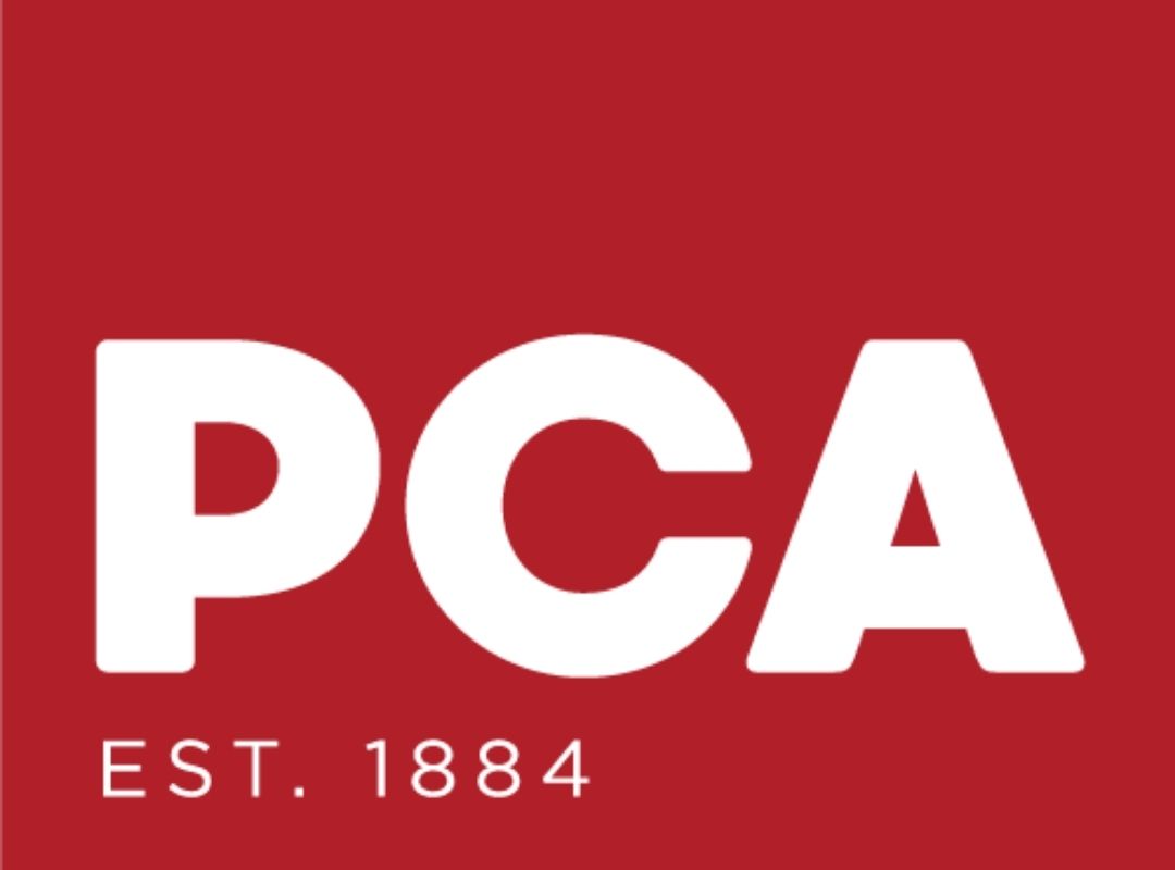 White letters PCA in bold font on a red background. Below, in smaller white text, it reads EST. 1884.